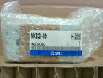  SMC MXS12-40 Cylinder Slide 0.15~-0.7 Mpa 12mm Bore 40mm Stroke Image